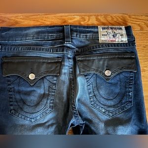 straight leg men's true religion 5 pocket world tour straight jeans.